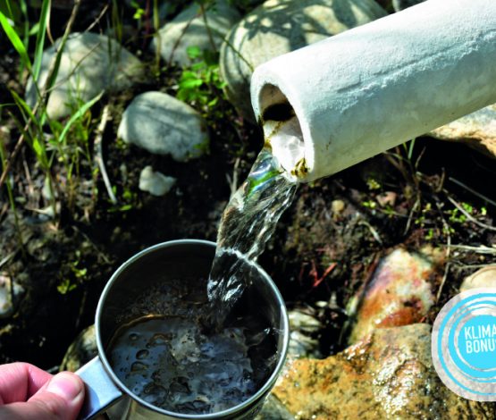Thema Wasser und Duschkopf Tausch Klimabonus, Quellwasser und Tasse drunter
